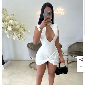 2 piece set. White bodysuit & white skirt.